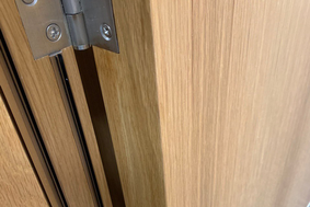 Wood Door edge chip restored